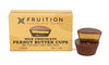 Fruition Chocolate Works milk chocolate peanut butter cups with caramel and sea salt on a white background